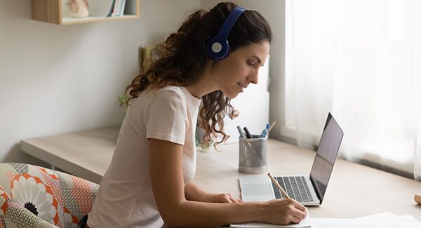 Women looking at her computer smiling